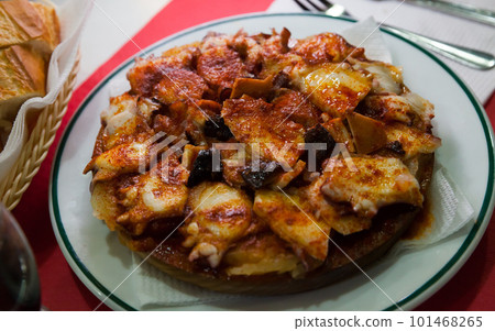 Galician style octopus 101468265