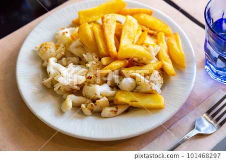 Roasted cuttlefish with fried potato Roasted cuttlefish with fried potato 101468297