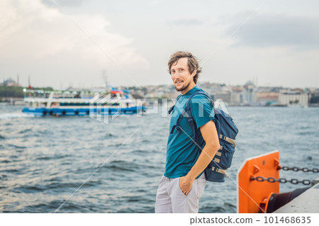 Man tourist enjoying Galataport area view, cruise port of Istanbul newly opening in 2021, located in the shores of the Galata, Karakoy in Istanbul 101468635