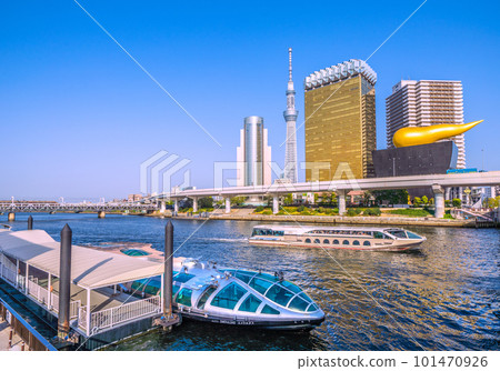 Tokyo cityscape, Japan Emeraldas waiting for departure at the Asakusa water bus boarding area. Behind is Jubilee. Unusual Spacia in the back left 101470926