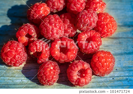 Raspberry on wooden table. Natural food background 101471724