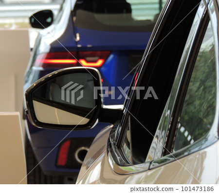 Unsold Cars In A Showroom Of A Car Retailer Unsold Cars In A Showroom Of A Car Retailer 101473186