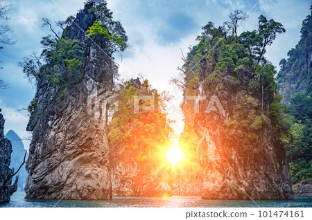 Incredible sunset Khao Sok National Park, Thailand. Cheow Lan lake Famous attraction adventure place travel Thailand. Asia holiday vacation trip 101474161
