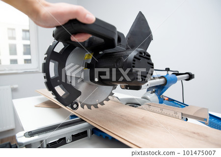 Board and miter saw, floor panel cut Board and miter saw, floor panel cut 101475007