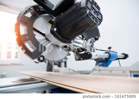 Board and miter saw, floor panel cut Board and miter saw, floor panel cut 101475009