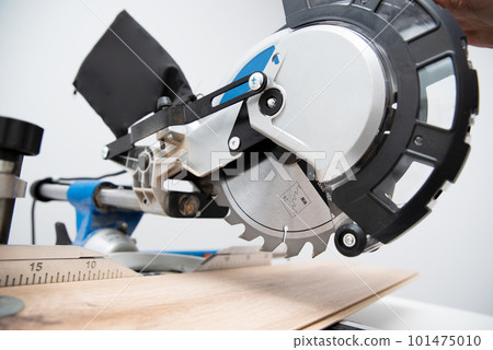 Board and miter saw, floor panel cut Board and miter saw, floor panel cut 101475010