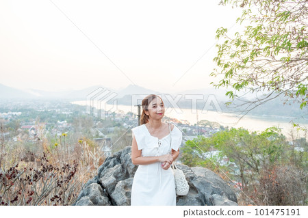 Portrait of Young Asian women at Mount Phou Si ,Luang Prabang in Laos Portrait of Young Asian women at Mount Phou Si ,Luang Prabang in Laos 101475191