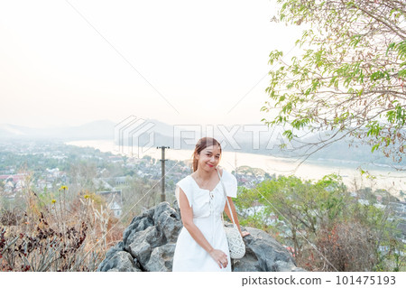 Portrait of Young Asian women at Mount Phou Si ,Luang Prabang in Laos Portrait of Young Asian women at Mount Phou Si ,Luang Prabang in Laos 101475193