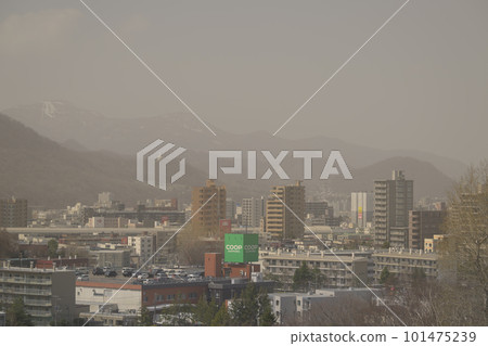 Cityscape foggy with yellow sand 101475239