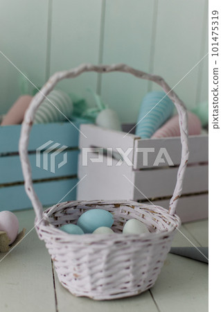 bucket with painted eggs for Easter basket background for the holiday bucket with painted eggs for Easter basket background for the holiday 101475319