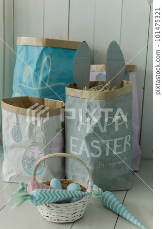 bucket with painted eggs for Easter basket background for the holiday bucket with painted eggs for Easter basket background for the holiday 101475321
