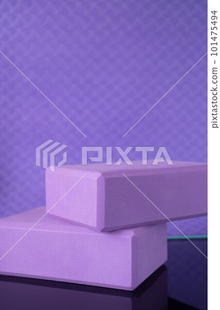 Purple geometric podium on textured background and reflective bottom. Modern product mockup design 101475494