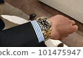 man wearing gold rolex 101475947