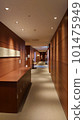 Empty hotel corridor 101475949