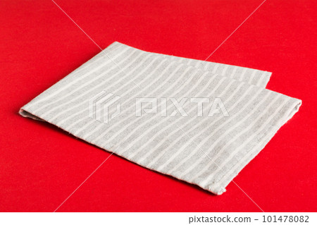 top view with gray kitchen napkin isolated on table background. Folded cloth for mockup with copy space, Flat lay. Minimal style 101478082