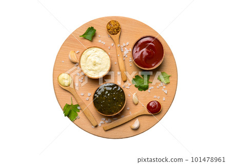 Many different sauces and herbs isolated on white background, flat lay top view. sauces on plate, healthy concept Many different sauces and herbs isolated on white background, flat lay top view. sauces on plate, healthy concept 101478961