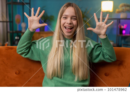 Excited happy young woman surprised shocked by sudden victory good win news celebrating wow reaction Excited happy young woman surprised shocked by sudden victory good win news celebrating wow reaction 101478962