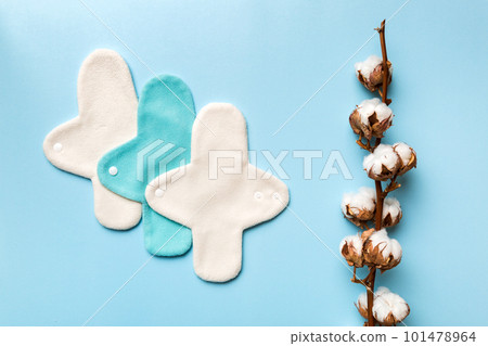 set of colorful bright reusable menstrual pads with cotton flower. zero waste woman periods concept top view with copy space set of colorful bright reusable menstrual pads with cotton flower. zero waste woman periods concept top view with copy space 101478964
