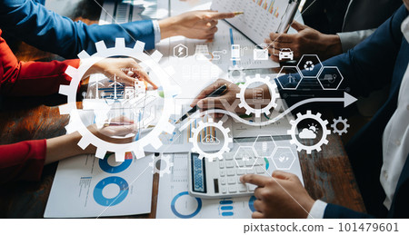 Business team working virtual modern smartphone to reduce CO2 emissions carbon footprint climate change to limit global warming.Sustainable development and green business concept. at office. Business team working virtual modern smartphone to reduce CO2 emissions carbon footprint climate change to limit global warming.Sustainable development and green business concept. at office. 101479601
