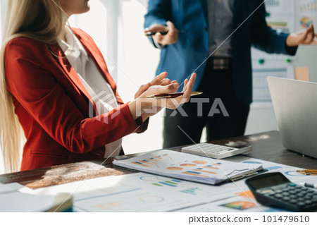 Businessman and team analyzing financial statement Finance task. with smart phone and laptop and tablet. Wealth management concept. Businessman and team analyzing financial statement Finance task. with smart phone and laptop and tablet. Wealth management concept. 101479610