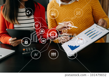 Working team meeting concept, business using laptop and smart phone and digital tablet computer with digital marketing media  in virtual icon network diagram office in morning light. 101479832
