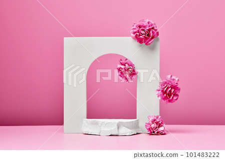 white podium with pink flowers, and arch on pastel pink background white podium with pink flowers, and arch on pastel pink background 101483222
