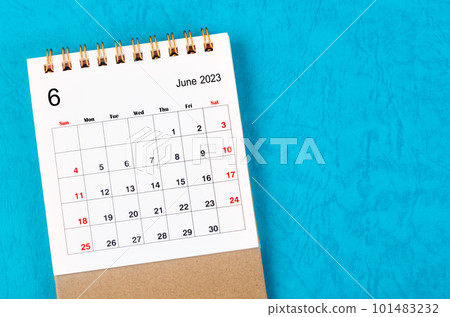 The June 2023 Monthly desk calendar for 2023 year on blue background. 101483232