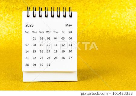 The May 2023 Monthly desk calendar for 2023 year on golden color background. 101483332