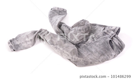 Worn grey jeans isolated on white Worn grey jeans isolated on white 101486299