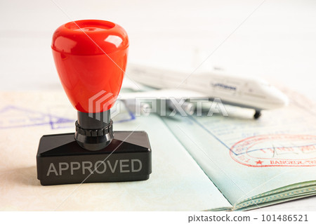 Approved Stamp visa and passport document to immigration at airport in country. Approved Stamp visa and passport document to immigration at airport in country. 101486521