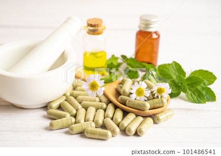 Alternative medicine herbal organic capsule with vitamin E omega 3 fish oil, mineral, drug with herbs leaf natural supplements for healthy good life. 101486541