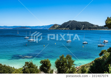 Beach Praia de Nosa Senora in Cies Islands, white sand and clear turquoise water, Galicia, Spain Beach Praia de Nosa Senora in Cies Islands, white sand and clear turquoise water, Galicia, Spain 101487074