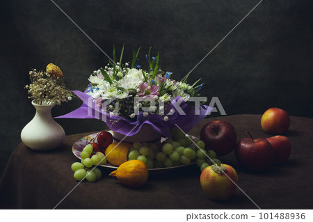 Still life with a bouquet of flowers and fruits 101488936