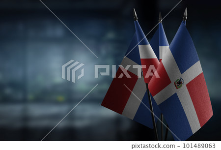 Small flags of the Dominicana on an abstract blurry background Small flags of the Dominicana on an abstract blurry background 101489063