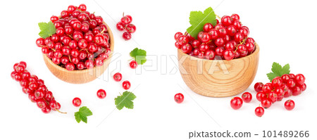Red currant berries in a wooden bowl with leaf isolated on white background Red currant berries in a wooden bowl with leaf isolated on white background 101489266