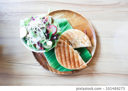 panini, italian sandwich and salad or ham and cheese sandwich panini, italian sandwich and salad or ham and cheese sandwich 101489273