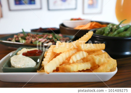 French fries or fried potato , fries or chips and food 101489275