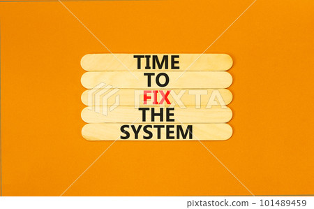 Time to fix the system symbol. Concept words Time to fix the system on wooden stick. Beautiful orange table orange background. Business and time to fix the system concept. Copy space. 101489459