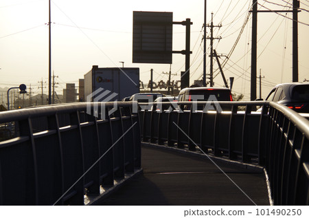 Scenery of evening sky and national highway hazy with yellow sand 101490250