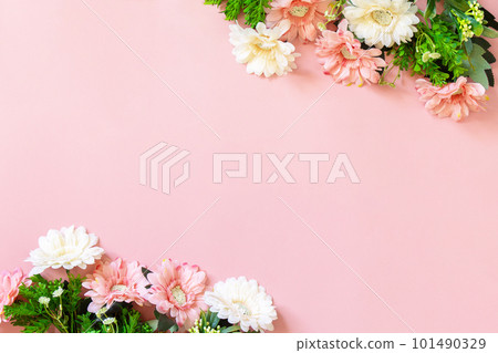 Mother's day or birthday greeting card concept. Festive flower arrangement on a pastel pink background. Top view flat lay. Copy space. Mother's day or birthday greeting card concept. Festive flower arrangement on a pastel pink background. Top view flat lay. Copy space. 101490329