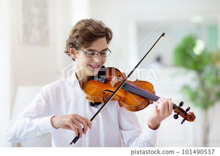 Man playing violin. Classical music instrument. Man playing violin. Classical music instrument. 101490537