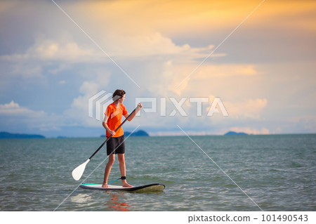 Man on stand up paddle. Water and beach sport 101490543