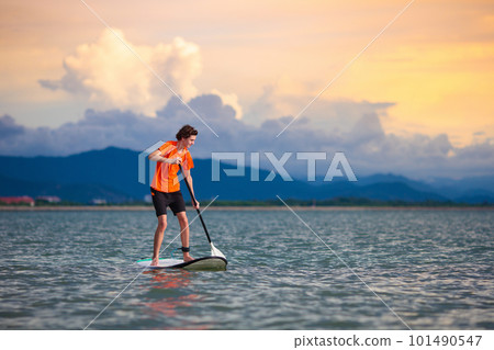 Man on stand up paddle. Water and beach sport 101490547