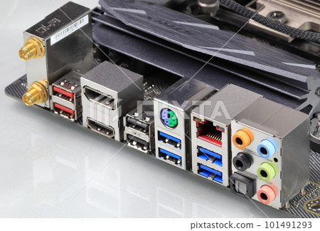 Multiple ports on modern computer mainboard show with HDMI, Display port, USB 3.2 type A, usb 3.1, Wifi, ps2, audio panel and LAN. Multiple ports on modern computer mainboard show with HDMI, Display port, USB 3.2 type A, usb 3.1, Wifi, ps2, audio panel and LAN. 101491293