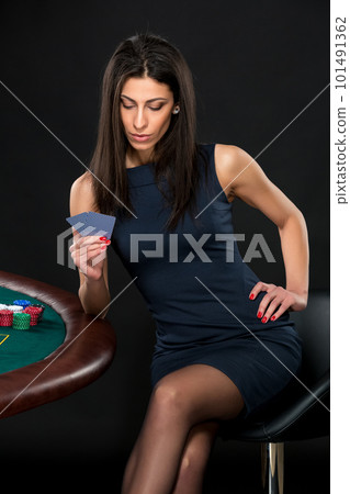 sexy woman with poker cards and chips 101491362