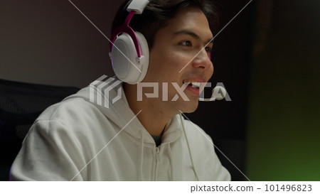 Game streamer using pc setup playing multiplayer first person shooter Game streamer using pc setup playing multiplayer first person shooter 101496823