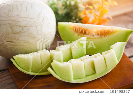cantaloupe melon on wooden plate, cantaloupe thai slice fruit for health green cantaloupe thailand cantaloupe melon on wooden plate, cantaloupe thai slice fruit for health green cantaloupe thailand 101498267