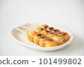 Tasty mitarashi dango on a white plate 101499802