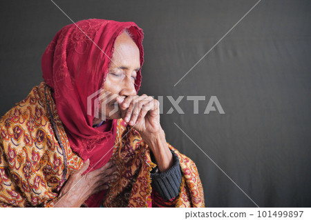 senior women coughing and sneezes senior women coughing and sneezes 101499897
