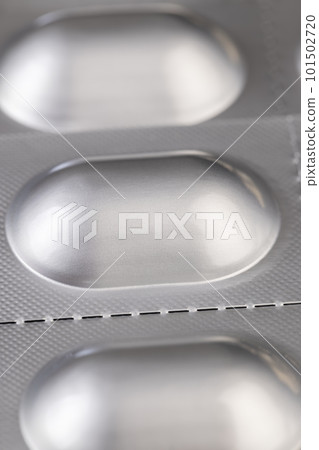 aluminum blister with medicines, close up 101502720